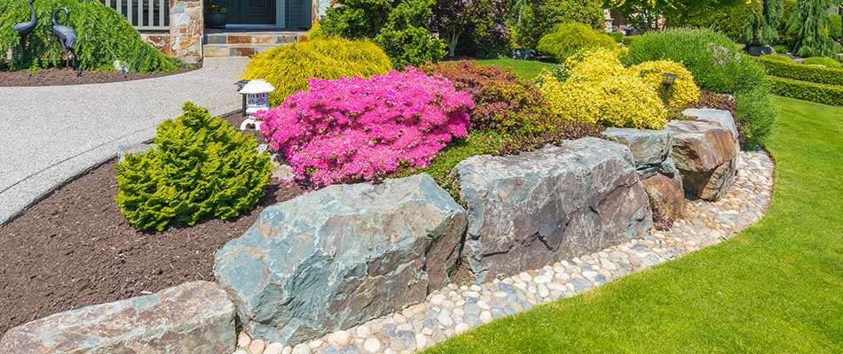 This custom landscaping in Mt. Juliet, TN helps to beautify the exterior of the home.